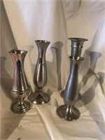 Group of four small pewter vases