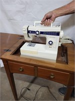 New Home Sewing Machine In Cabinet  works but