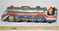 VINTAGE SILVER MOUNTAIN BATTERY OPERATED TIN TOY