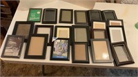 Assorted black picture frames