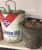 Skelly oil can and other can