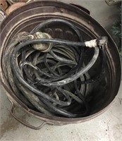 Heavy electric cord and garbage can