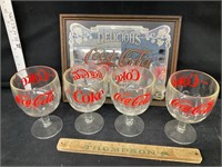 Coke glasses and mirror sign