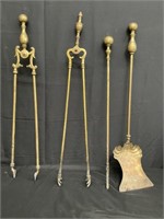 Group of brass and iron fireplace tools