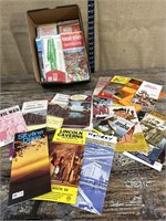 Box of vintage vacation advertisement pamphlets