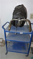 blue cart and metal fan