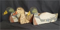 Group of cardboard duck decoys