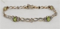 .925 silver & peridot tennis bracelet 7.5"