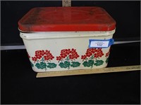 Red lidded bread box with flowers