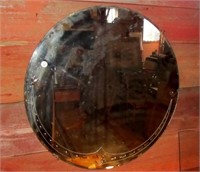 1940's Round beveled mirror. Measures 23" in