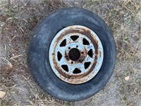 LT235-75-16 Tire and 6 bolt rim, approx 75% tread