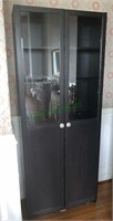Tall black china cabinet with four adjustable