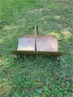 Vintage brass firewood holder
