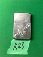Zippo lighter with skull and crossed wrenches