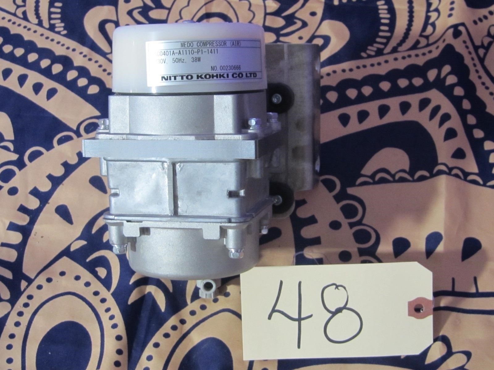 New Nitto Kohki AC0401A-A1110-P1-1411 Compressor