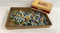 Mac Cigar box with marbles