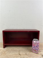 Small red wooden shelf