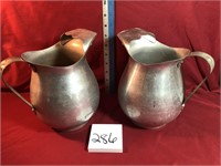2 vintage aluminum pitchers