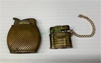 One pair of vintage brass, cigarette lighters 290