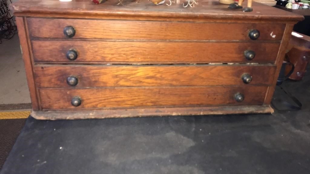Wood 4 drawer 26x12x15 table top cabinet full of