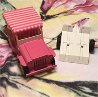 Pink metal Toni’s Jeep And Hauler