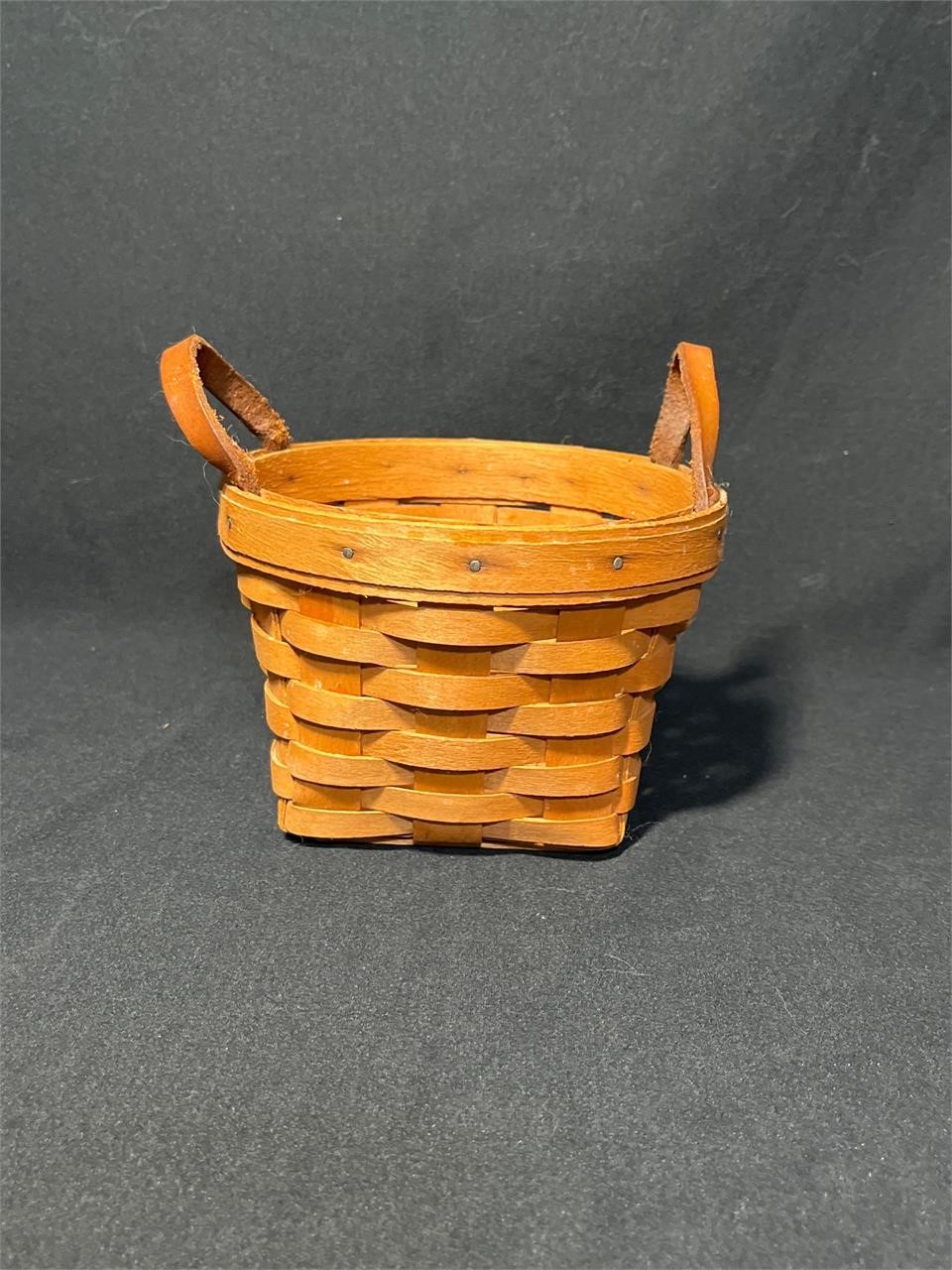 Small Longaberger basket with leather handles