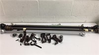 Four Curtain Rods and Attachments M10C