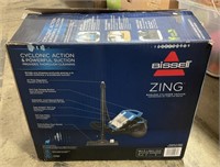 New In Box Bissell Zing Bagless Vacuum.