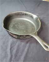 Good cast iron skillet approx 8 inches diameter