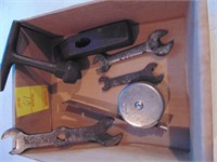 assorted wrenches, extension tape rule