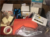 Misc office supplies; scissors, post it notes