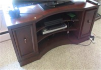 Wood TV stand. Measures: 29"Hx52"Wx22"D. Note: No