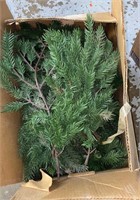 Box of tree limbs