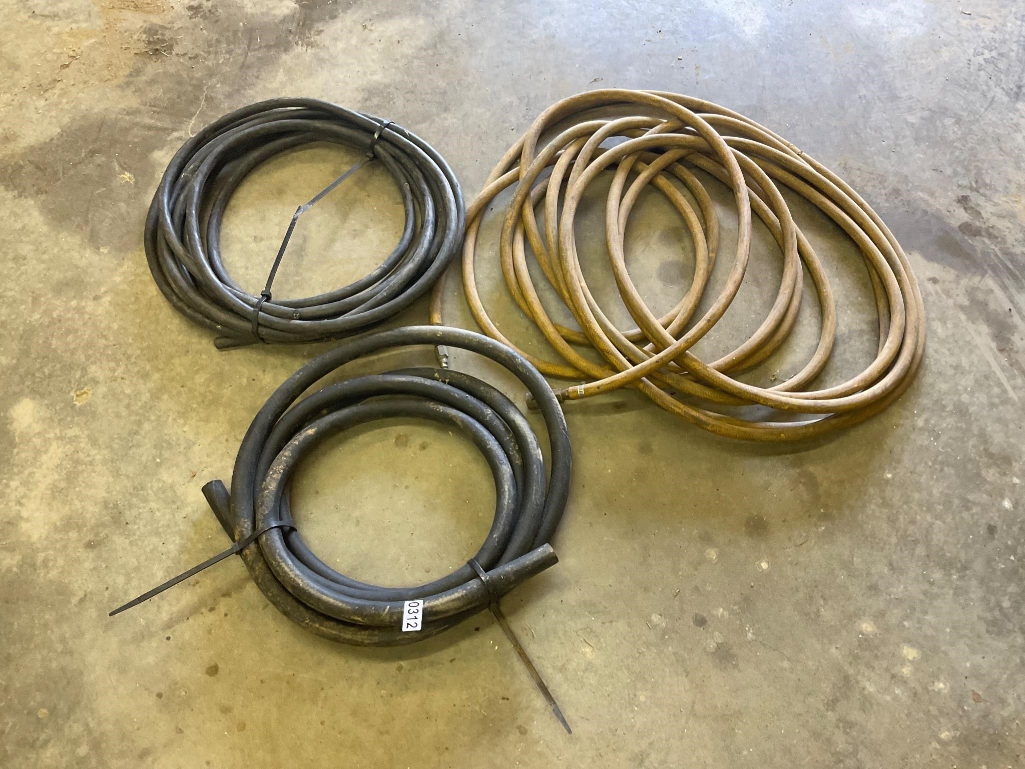 Air hose, heavy electric cable. Hose