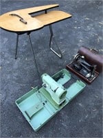 2 Vtg Sewing Machines & Wood Table ELNA Singer