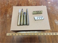 (2) Gun Clips & (3) 50 Cal Bullets & (1) Shell