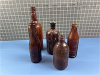 DARK BROWN ANTIQUE BOTTLES