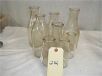 L214 Qty 9 Various Milk Bottles with Plastic Crate