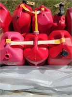 Three red five gallon gas cans