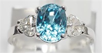 $8750. 14K Blue Zircon Diamond Ring