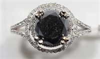 $9205. 14K Diamond Ring