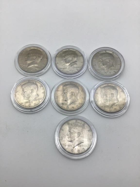 Lot of 7 Uncirculated Kennedy Half Dollars