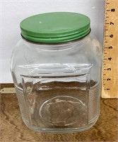 Square glass canister jar with green metal lid