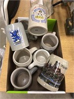 Box of eight ceramic beer mugs most of them from