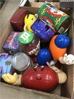 Box of tins and M&M dispensers