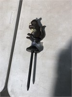 Squirrel hose guard 11 inches tall - cast iron