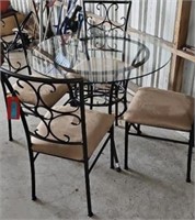 brand new 38" glass top table w/4 chairs