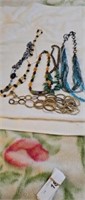 5 necklaces and 2 magnet necklaces