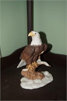 Bald Eagle Figurine on Branch Above Clouds