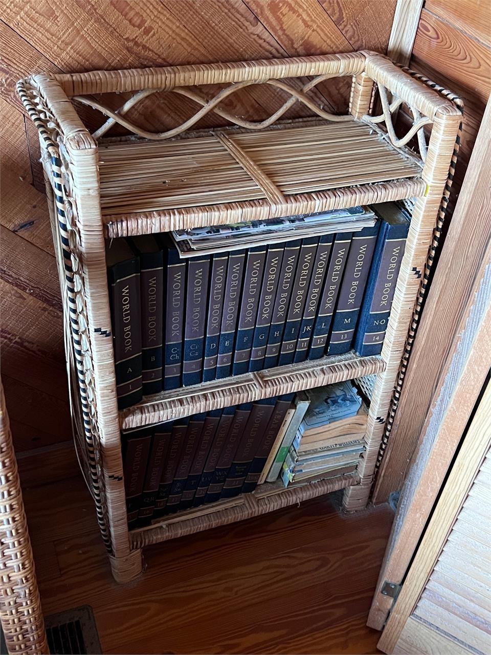 Vintage wicker bookcase and contents